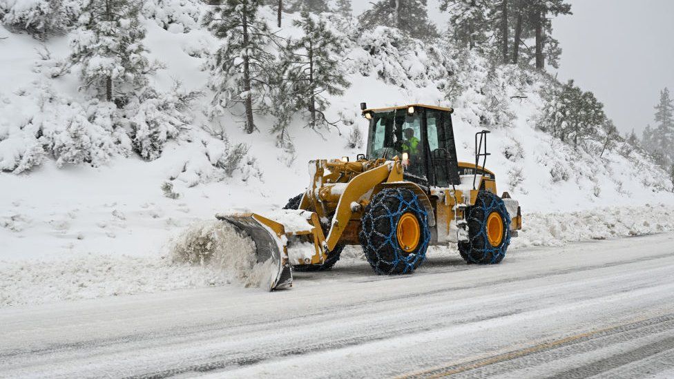 A snow plough clearing snow from roads in Lake Tahoe, California