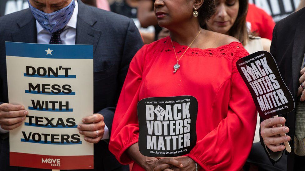 Members of the Texas House Democratic Caucus take part in a voting rights rally outside of the Texas State Capitol on the first day of the 87th Legislature's special session on July 8, 2021 in Austin, Texas