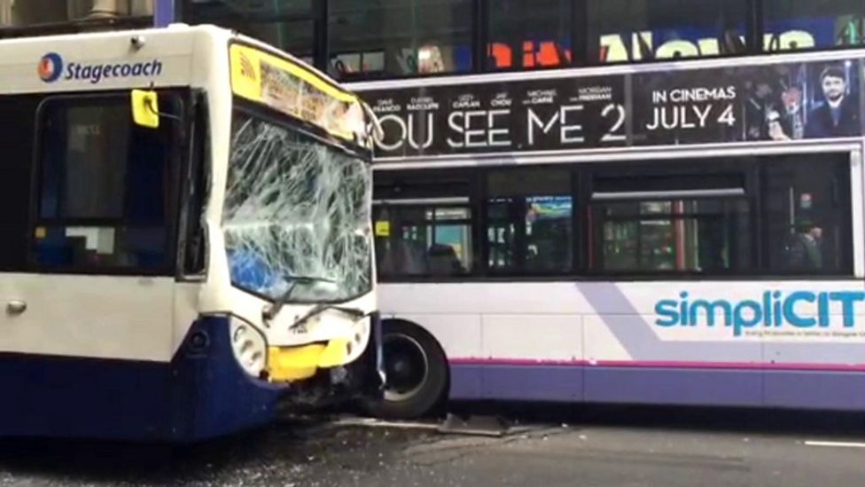 Driver suspended after 'runaway' bus crash in Glasgow - BBC News