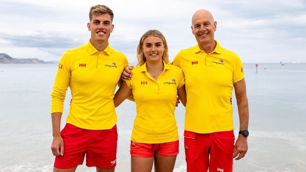 lifeguard dad with male and female lifeguard kids