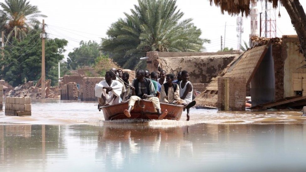 Sudanese return to look for household items to salvage following heaving floods in Wad Ramli, some 45 km north of Khartoum, Sudan, 25 August 2019.