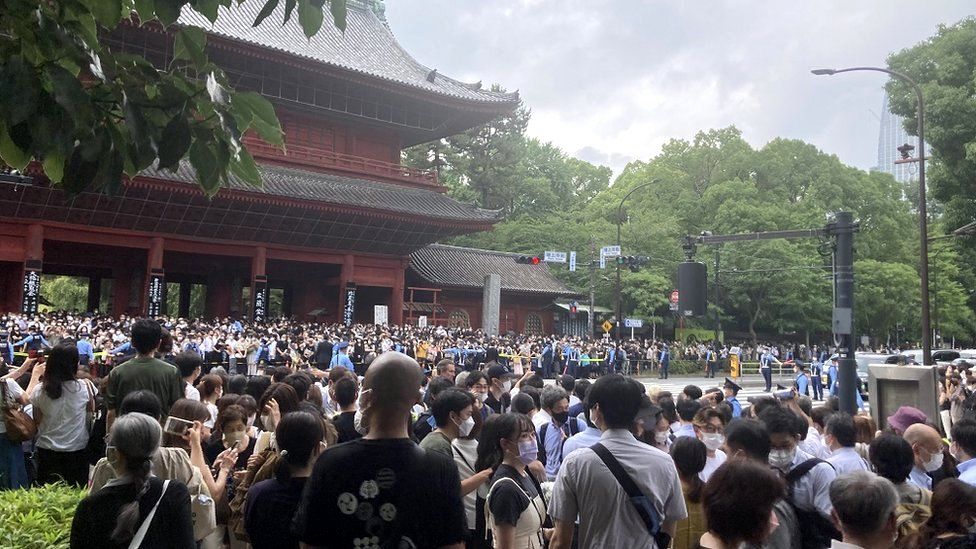 Throngs of people show up to pay their last respects to the former Japanese PM Shinzo Abe at Zojoji Temple in Tokyo on 12 July, 2022.