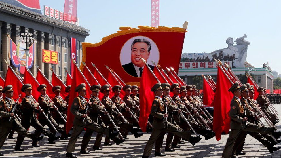 Servicemen march during a military parade marking the 70th anniversary of the foundation of North Korea.