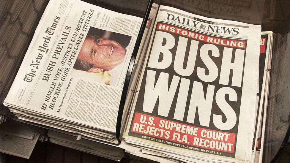 Newspapers give the results of the US Supreme Court''s decision to halt the Florida ballot recount, claiming George W Bush as the victor for the presidency December 13, 2000