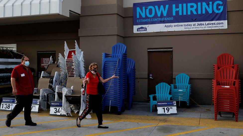 A "Now Hiring" sign advertising jobs at Lowe's is seen as the spread of the coronavirus disease (COVID-19) continues, in Homestead, Florida, U.S., April 17, 2020.