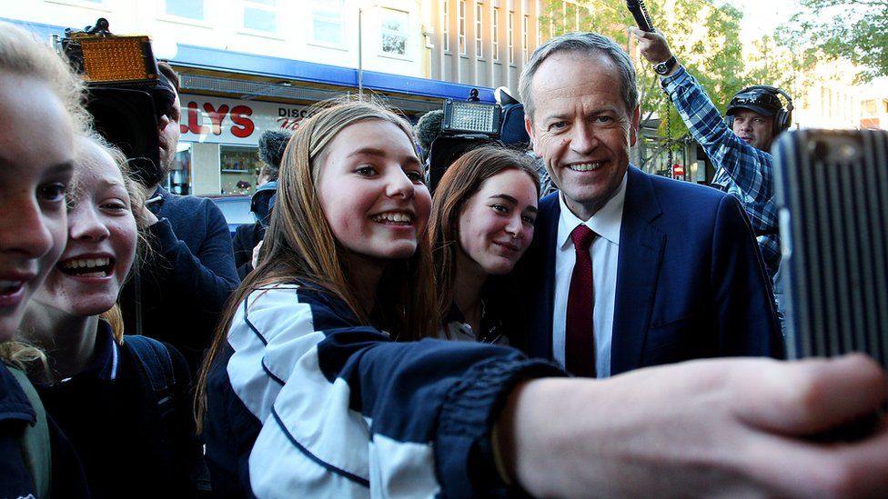 Opposition Leader Bill Shorten poses for a photo with fans on the campaign trail.