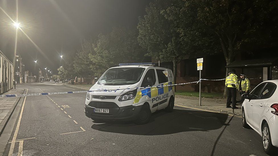 A police van and two officers