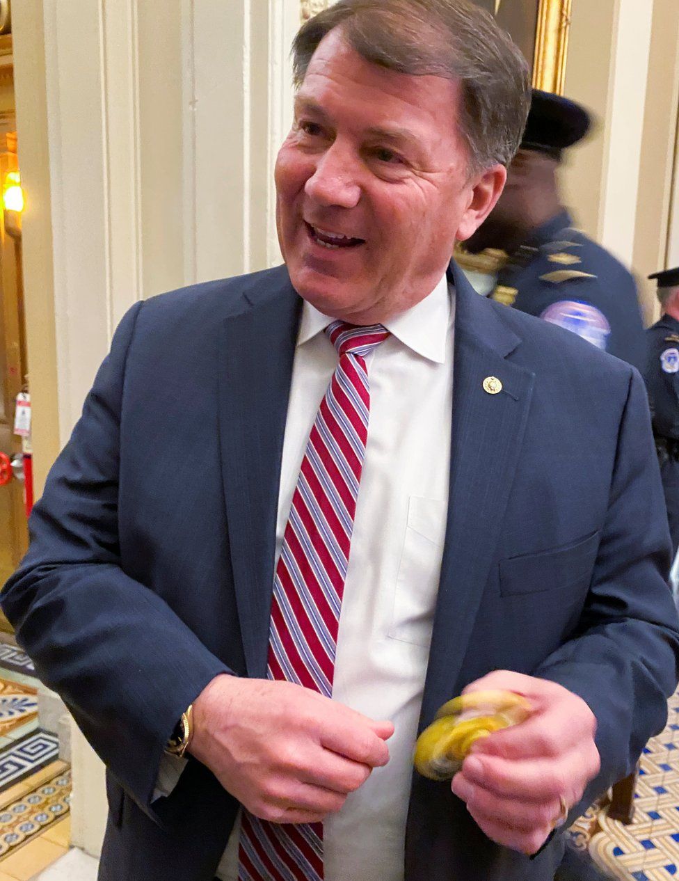 U.S. Senator Mike Rounds (R-SD) plays with a fidget spinner