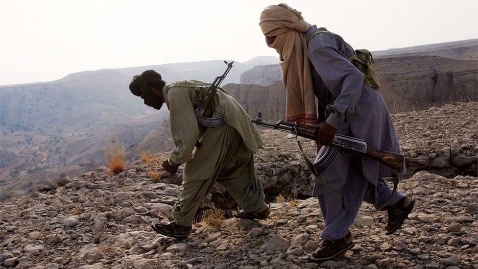 Marri tribal guerrillas prepare to attack a Pakistani troop outpost January 31, 2006 near Kahan in the Pakistani province of Balochistan.