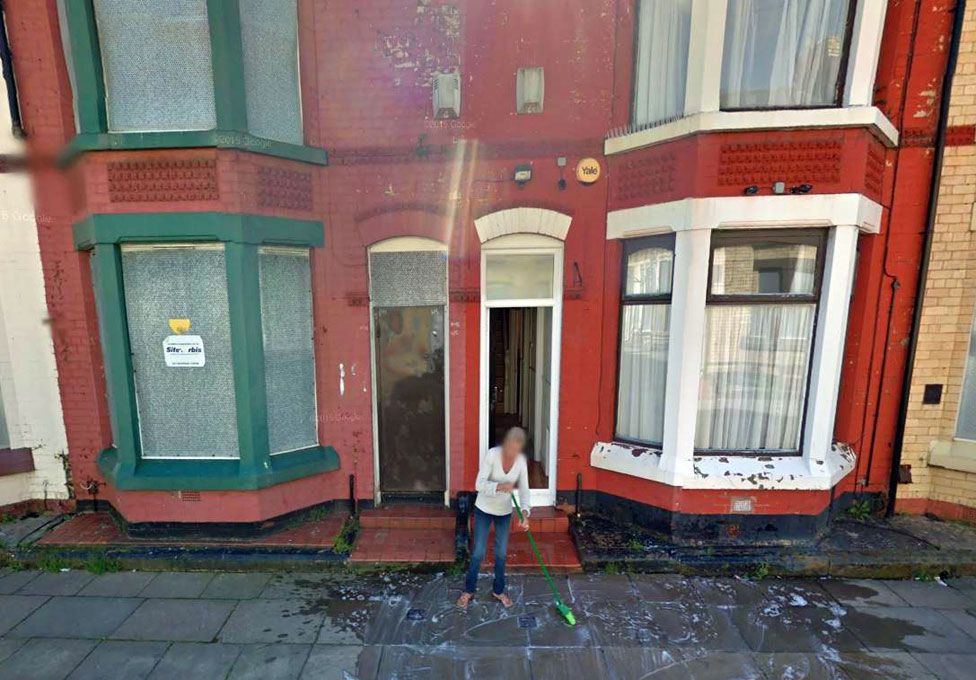 This shot from Google Streetview shows Lynda cleaning the pavement