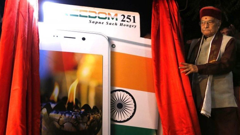 Bhartiya Janta party (BJP) senior leader Murli Manohar Joshi unveils a poster during the launch of the "Freedom 251" smartphone in New Delhi, India, 17 February 2016.