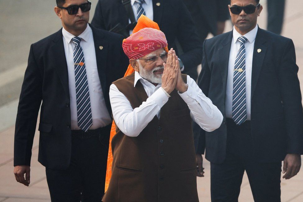 Prime Minister Narendra Modi gestures towards the crowd on Republic Day in New Delhi, India, January 26, 2024