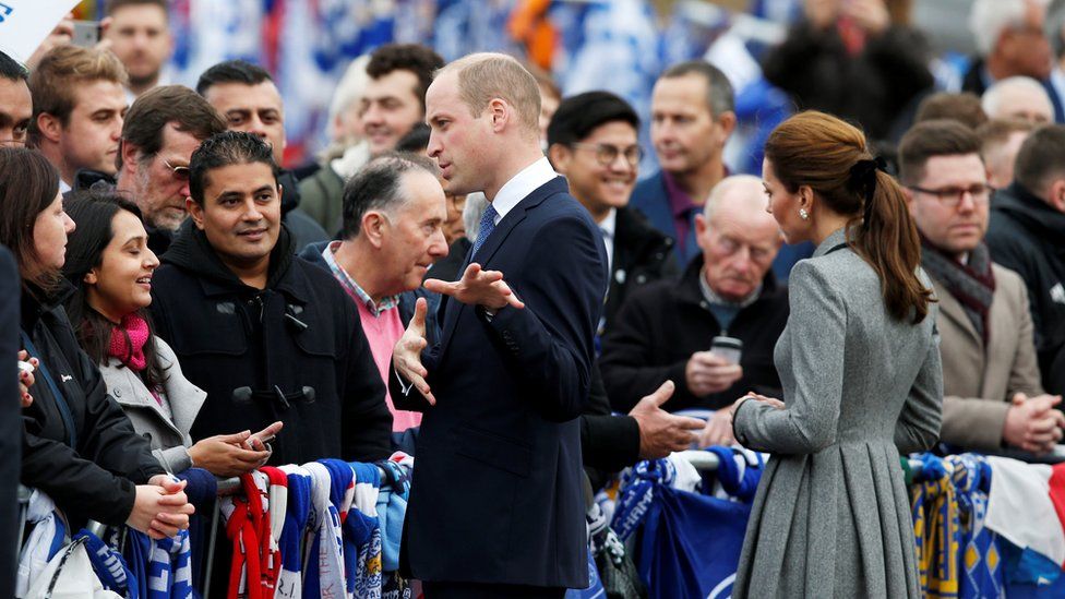 Prince William and Catherine talking to the crowd