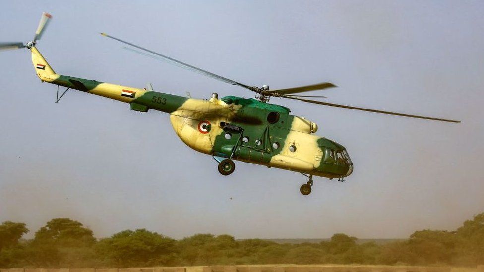 A military helicopter landing at a RSF base in Darfur, Sudan - archive shot