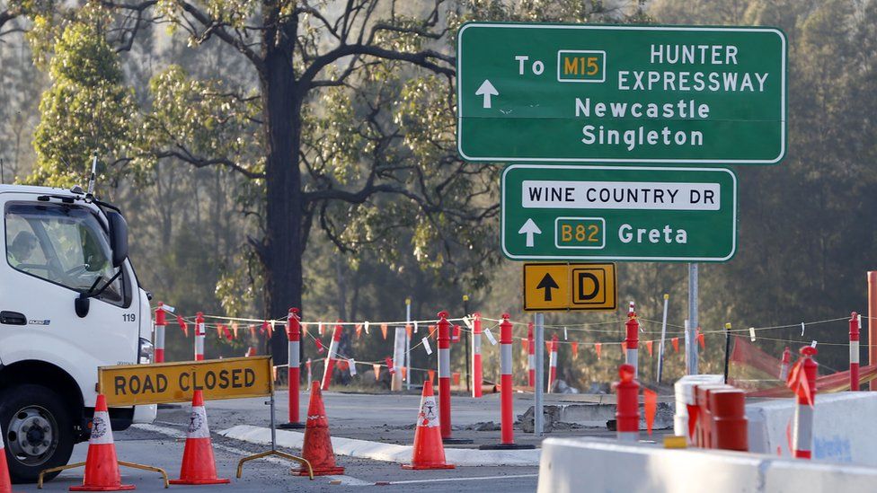 The Blocked road at Wine Country Drive, Greta, which leads to the scene of a bus crash in Hunter Valley, New South Wales, Australia