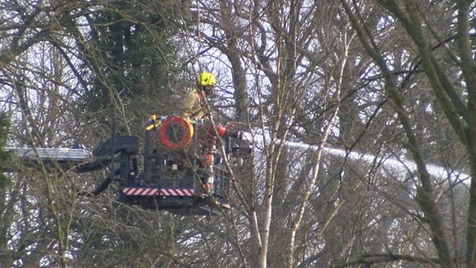 Firefighter on aerial platform