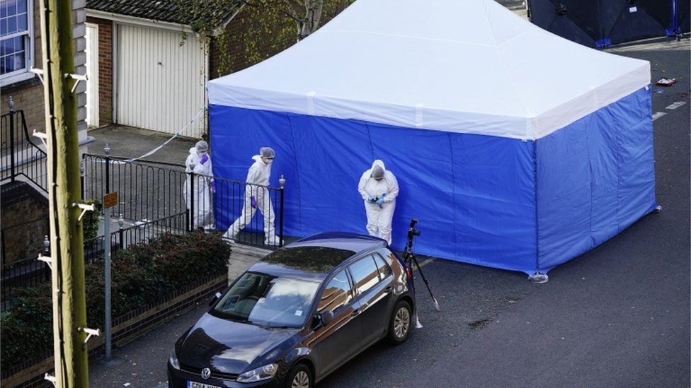 Forensics officers at Regency Court