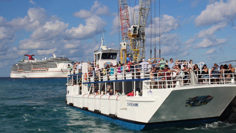 Tenders ferry tourists from the cruise liners to shore in Grand Cayman