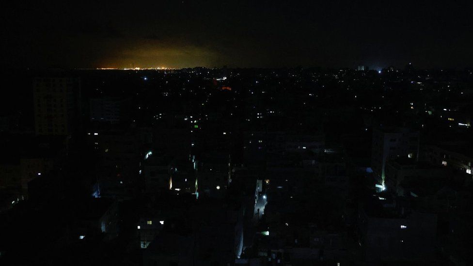 A view of the Gaza Strip at night, after its sole power plant ran out of fuel (11 October 2023)