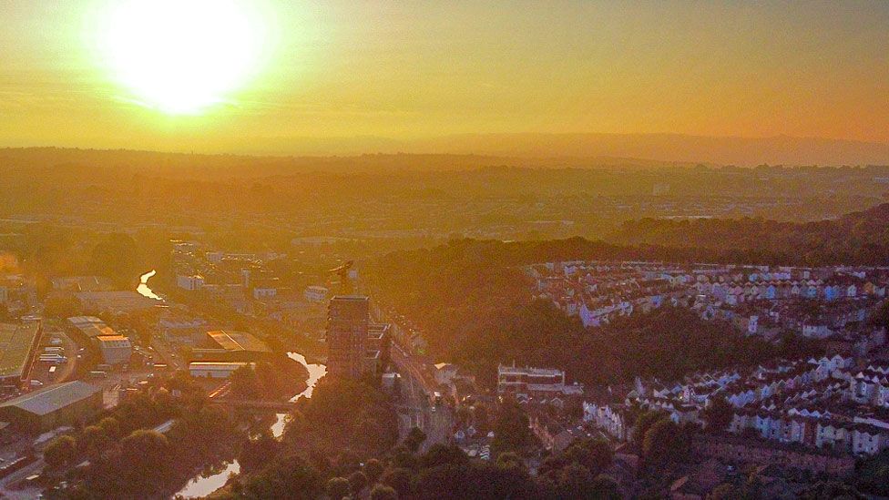 The sun rises over colourful houses in Totterdown, Bristol, on 5 September 2023