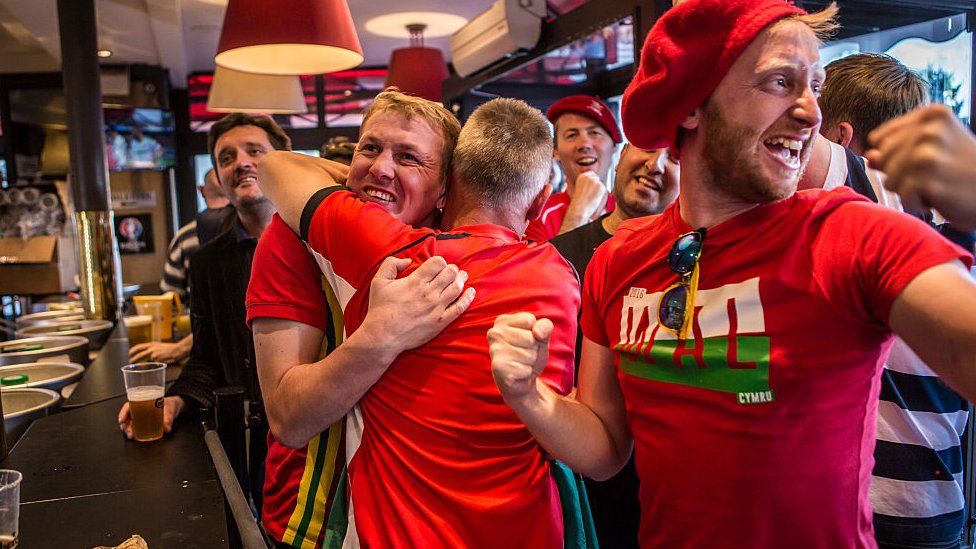 Wales fans in a pub
