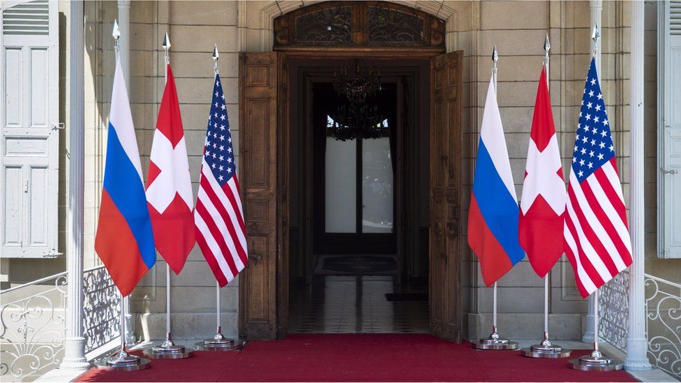 Flags of the US, Russia and Switzerland photographed in front of the entrance of the villa La Grange, one day prior to the US - Russia summit in Geneva, Switzerland, 15 June 2021.