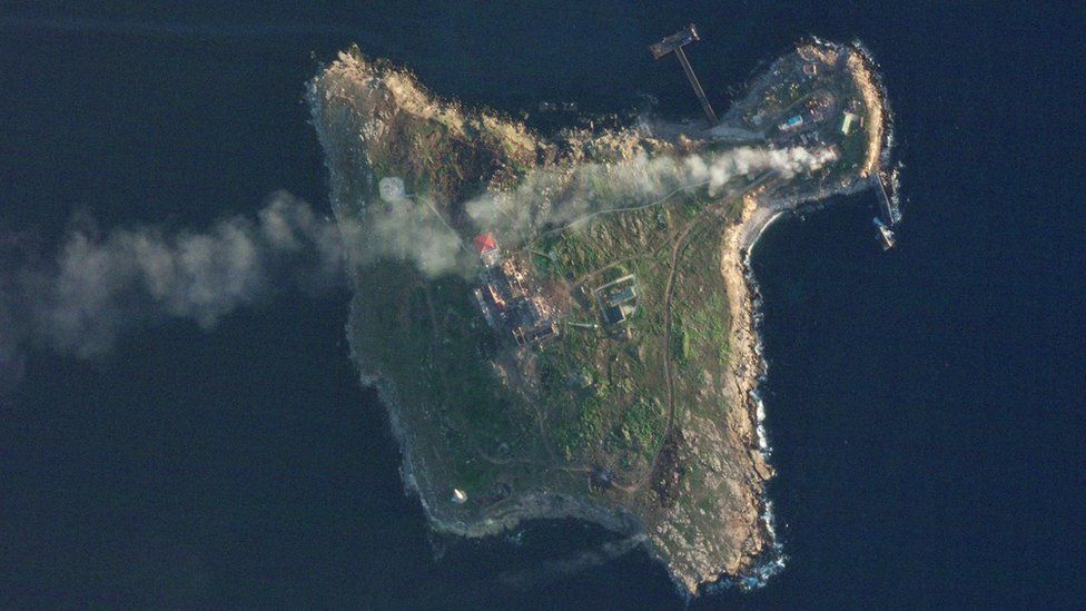 Satellite view shows smoke rising over Snake Island, Ukraine amid Russia"s attack on the country, May 8, 2022 in this handout image. Planet Labs PBC
