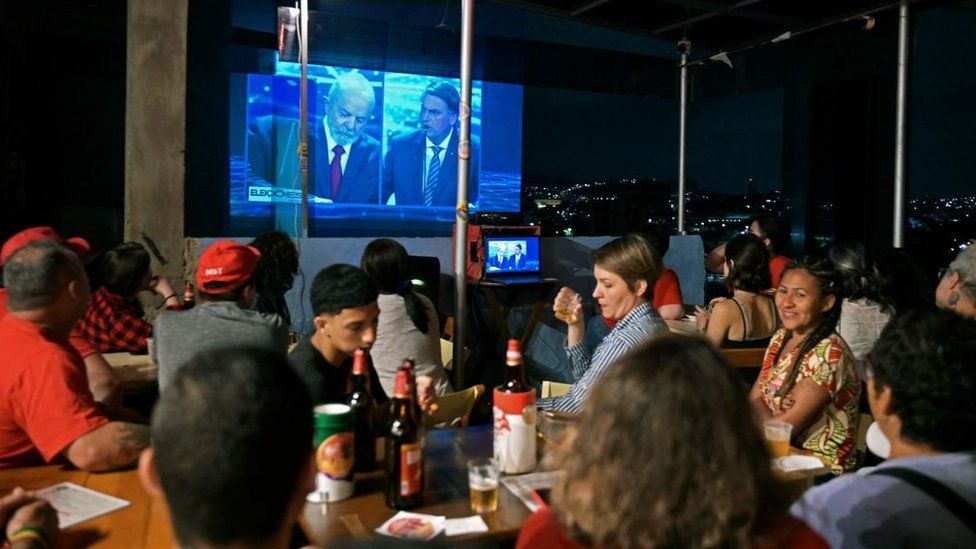 The presidential debate projected onto a building in Rio de Janeiro