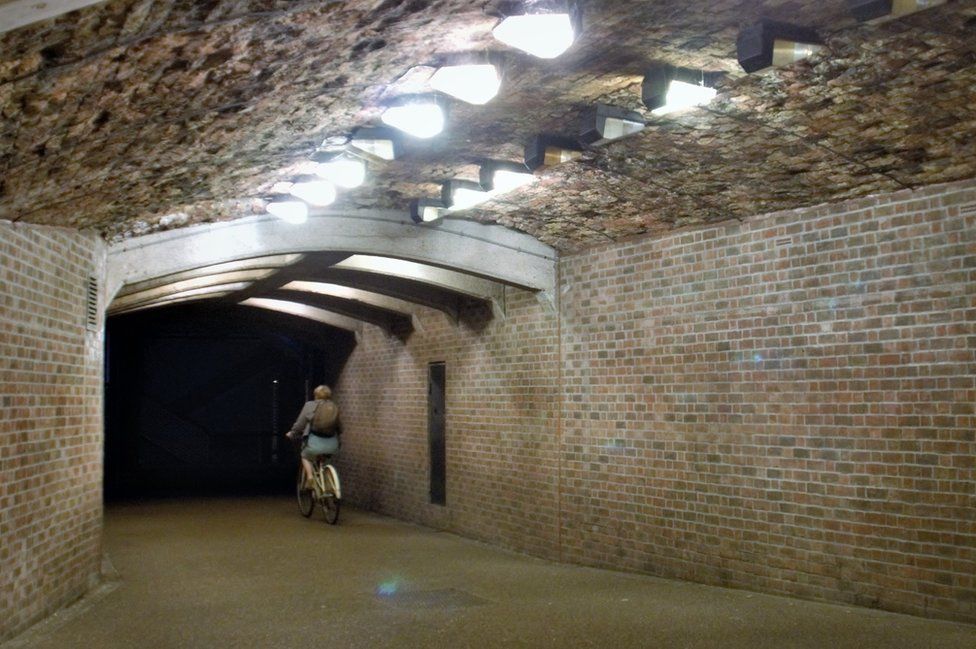 Cyclist in a tunnel