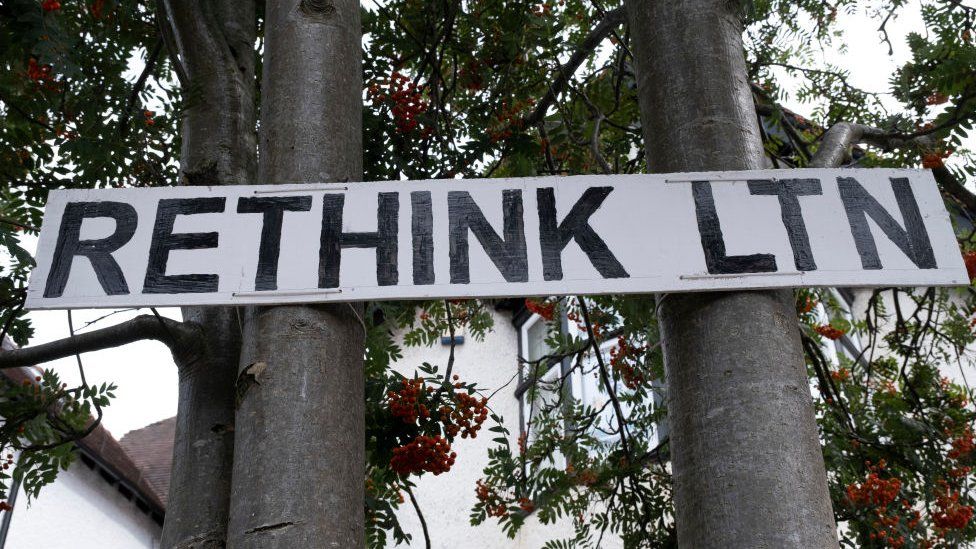 Protest sign 'rethink LTN' against the Low-traffic neighbourhood barriers put in place in Kings Heat