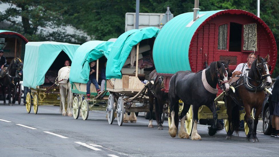 Convoy of horse drawn vehicles