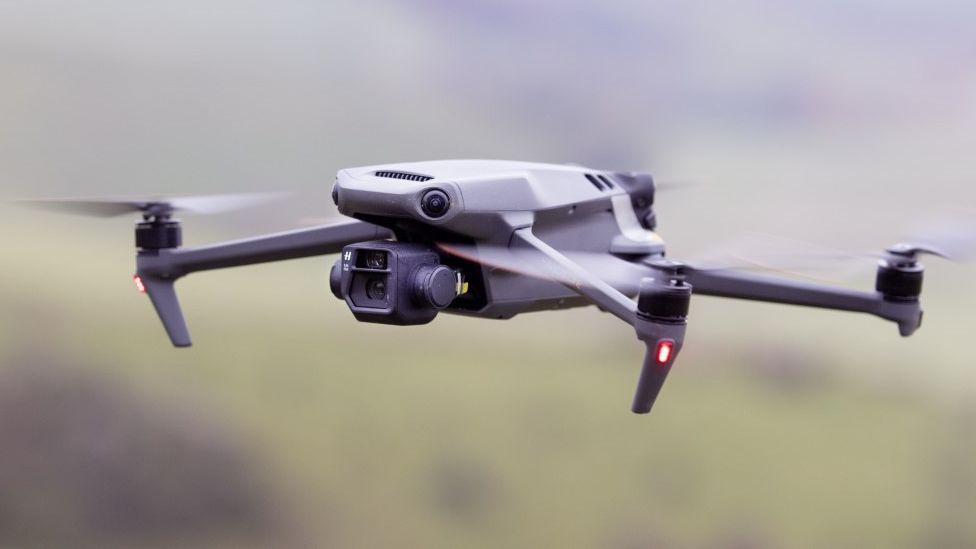 A Chinese-made DJI Mavic drone in flight