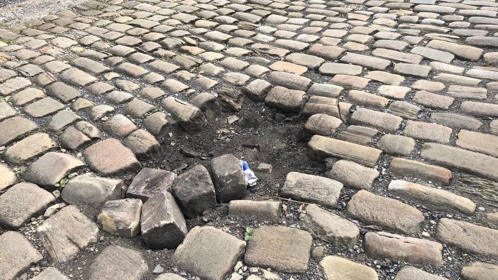 Part of the damaged cobbles