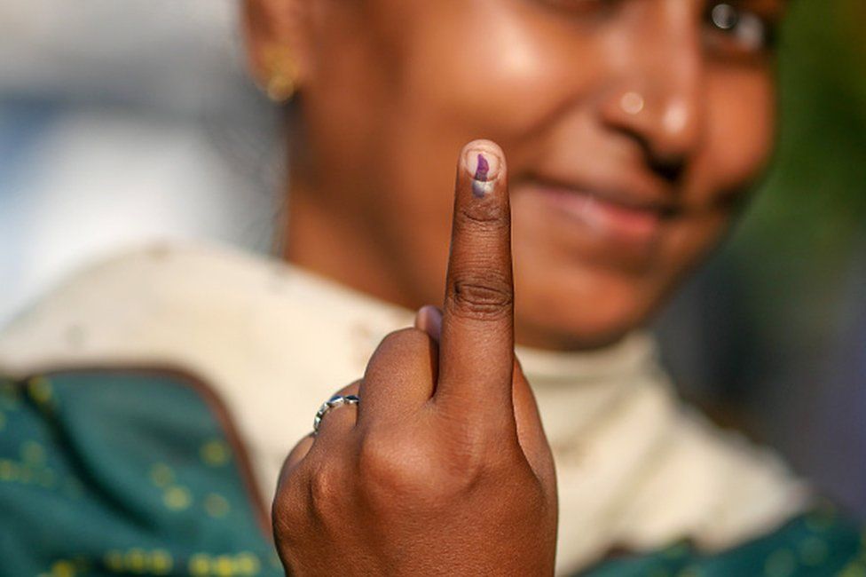 A voter's finger is marked with indelible ink after casting a ballot at a polling station during the first phase of voting for national elections in Chennai, Tamil Nadu, India, on Friday, April 19, 2024.