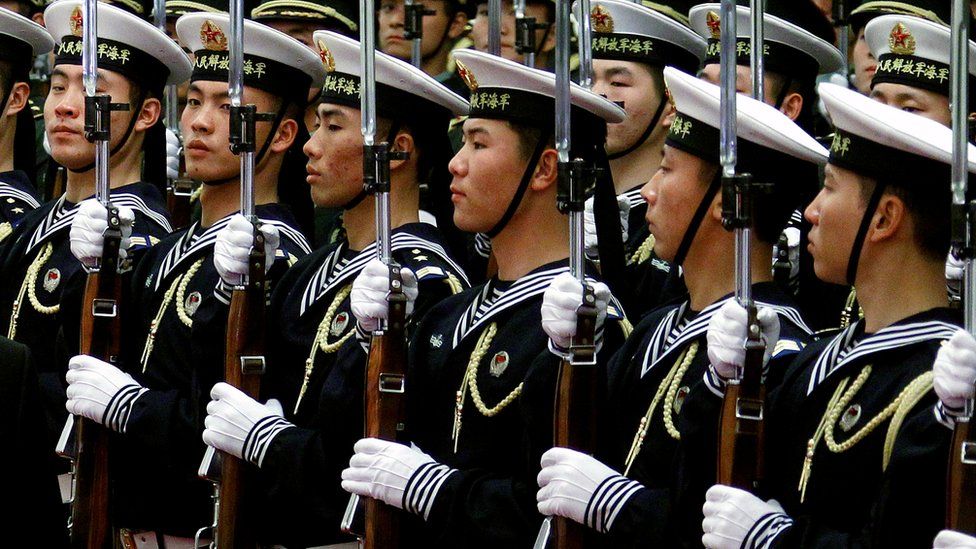 FILE PHOTO: An honour guard consisting of members of the Chinese navy stand in formation during a welcoming ceremony in the Great Hall of the People in Beijing November 23, 2011