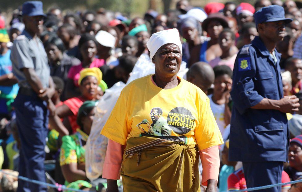 Supporters of Zimbabwean President Robert Mugabe attend a rally in Marondera, Zimbabwe,