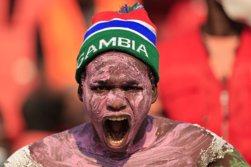 A Gambian fan shouting at a stadium in Bafoussam, Cameroon - Monday 24 January 2020