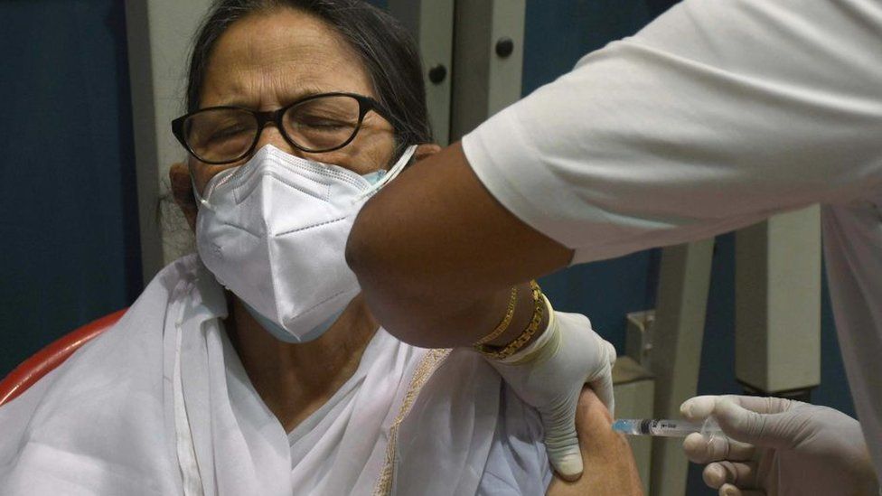 Woman receiving Covid vaccine in Guwahati, Assam state