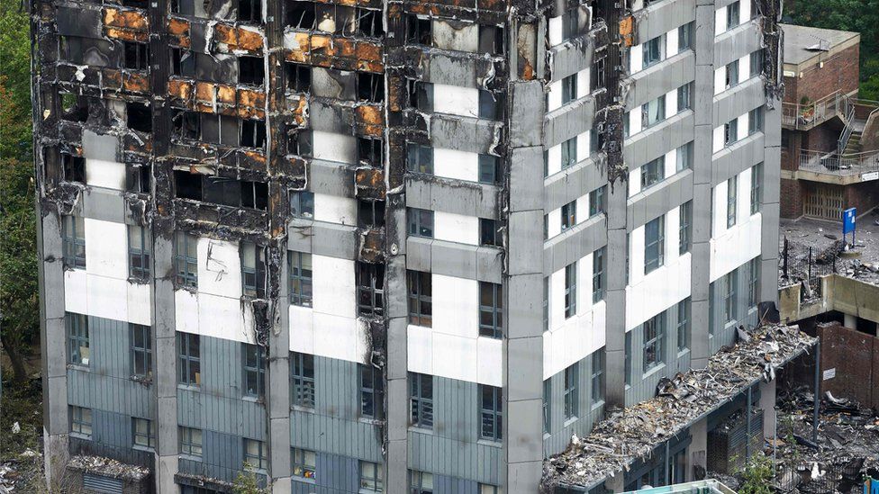 Close up of the charred remains of Grenfell Tower after the blaze