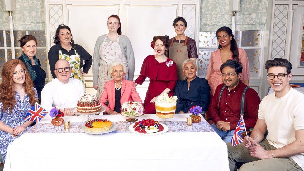 The finalists and judges of The Queens Jubilee Pudding: 70 Years in the Baking. (left to right) Jane, Susan, Roger, Jemma, Kathryn, Mary, Regula, Sam, Monica, Shabnam, Rahul, Matt.
