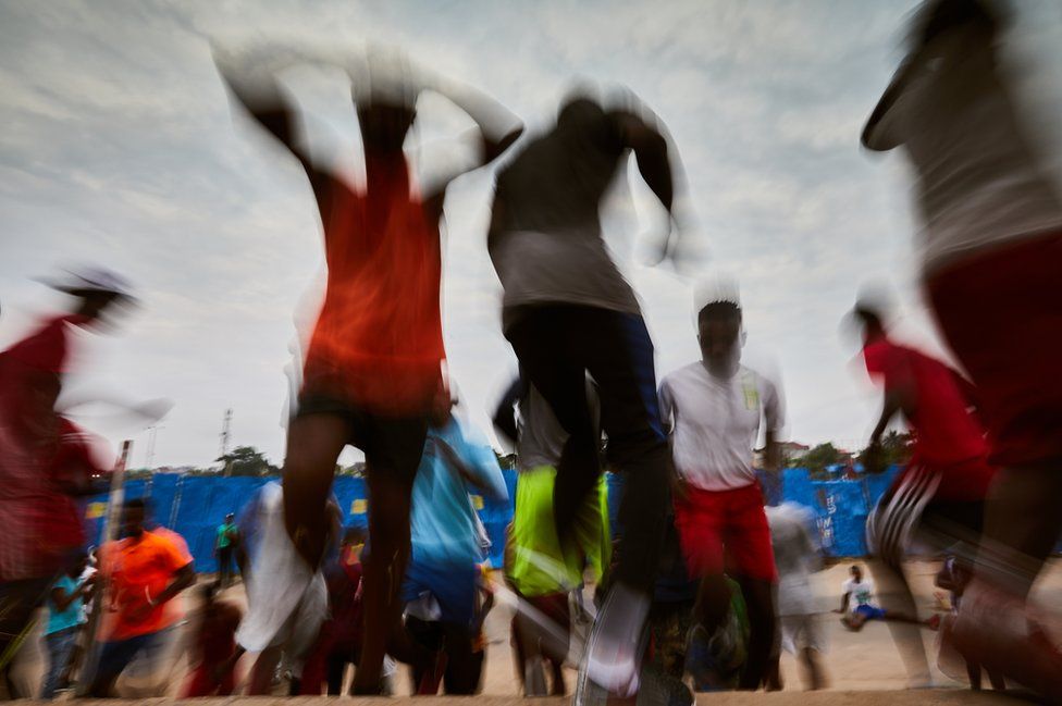 Boxers warming up outside the Stade