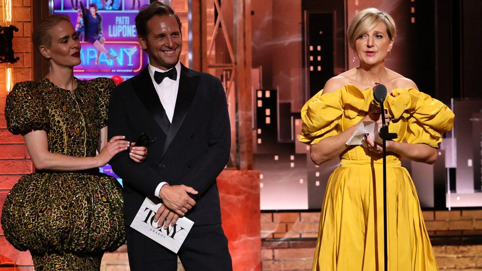 Marianne Elliott (right) accepting her Tony Award for best director of a musical for Company