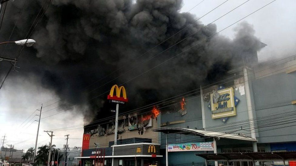 Burning shopping mall in Davao, the Philippines