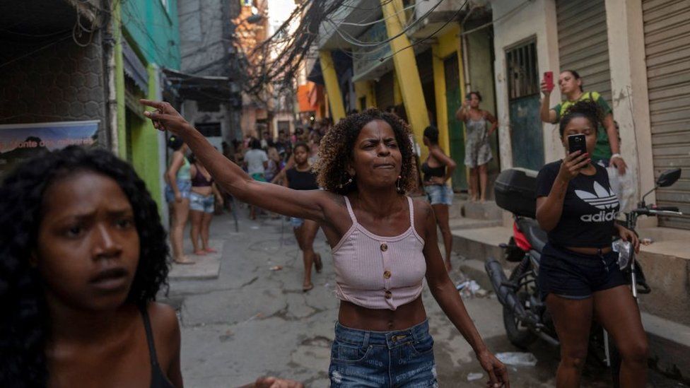 Residents protest after a police operation against alleged drug traffickers at the Jacarezinho favela in Rio de Janeiro