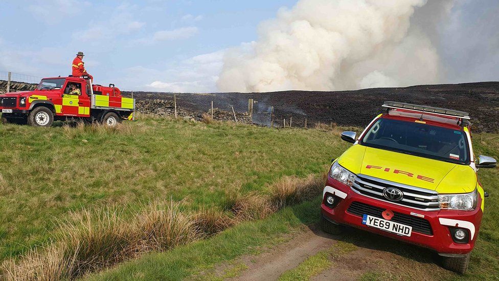 Fire service vehicles at moor fire