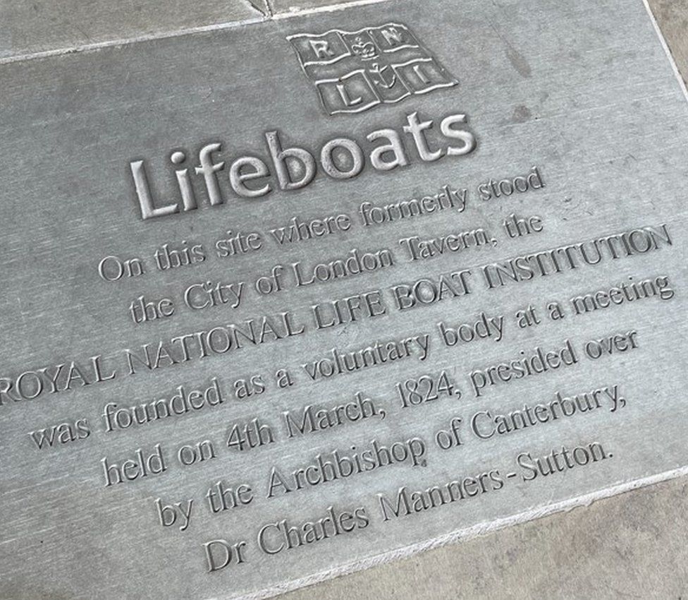 The carved stone plaque, paying tribute to those who started the RNLI 200 years ago on that spot