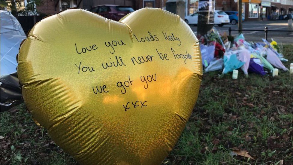 Flowers and messages left at the scene on Harvey Road in Allenton, Derby