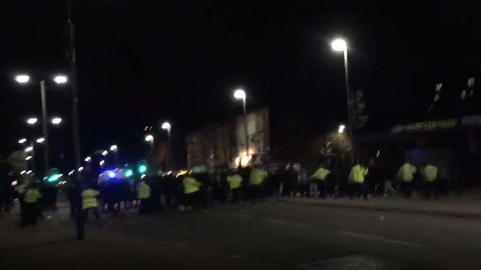 Police and public on streets in Leicester on 18 September