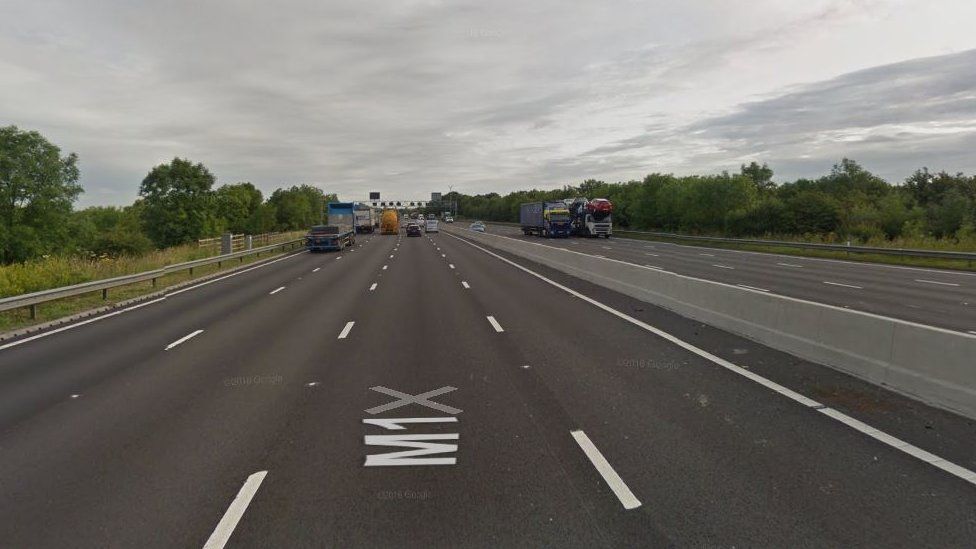 Woman, 62, killed in M1 broken-down car crash - BBC News