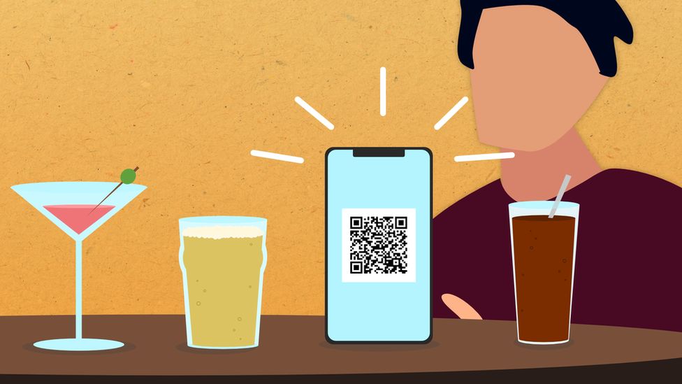 A man using an app to order drinks